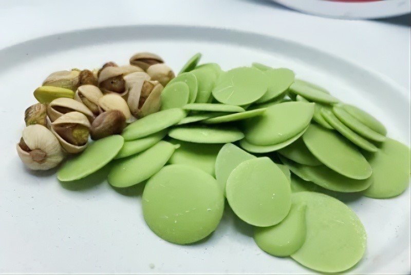 Глазурь "Шокомилк" со вкусом фисташки (монеты), кор.6,5 кг