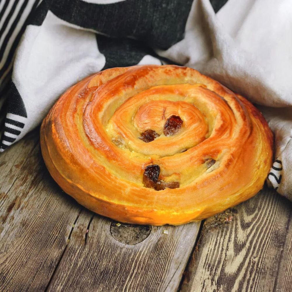 Улитка с ванильн.начинкой и изюмом (заморож.) (45гр*84шт/уп.) [5631]